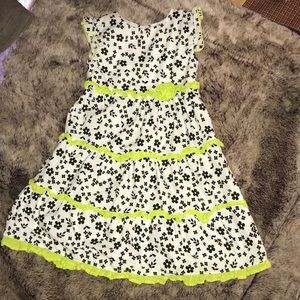 PENNY M. Ruffle shoulder dress.